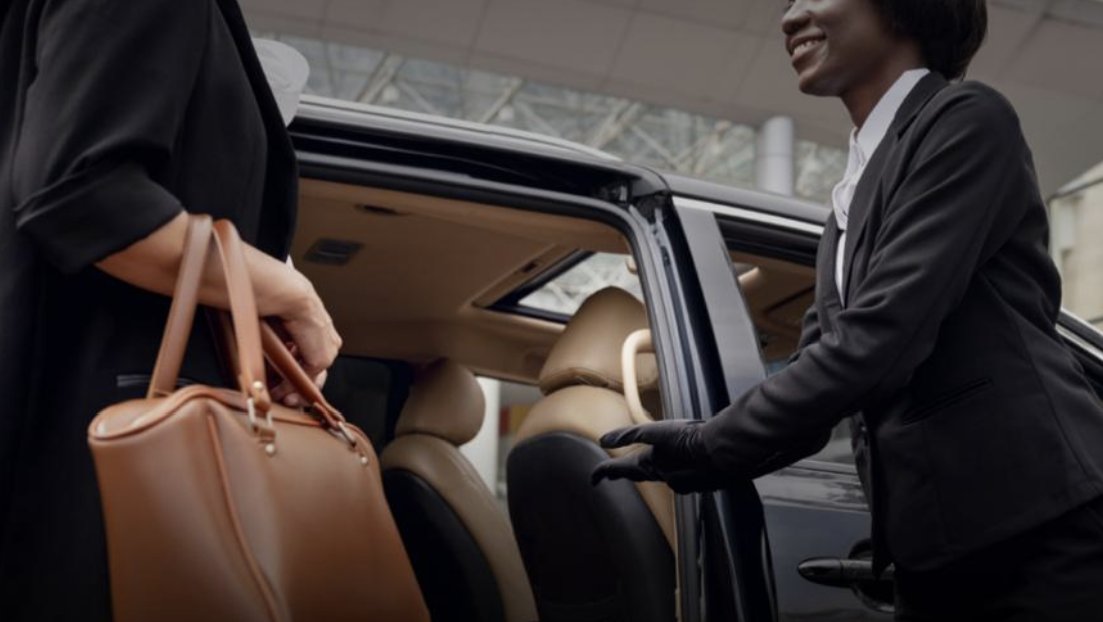 Chauffeur greeting a guest for airport pick-up in Lagos