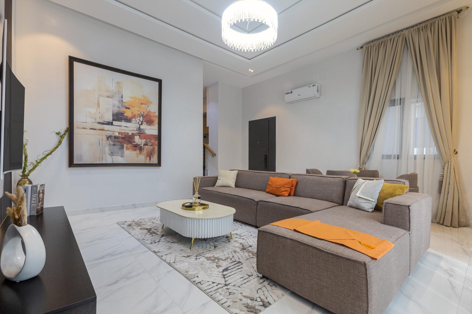 Lounge with sectional sofa, Apartment Bravo, Nimbus Nook Ikeja GRA