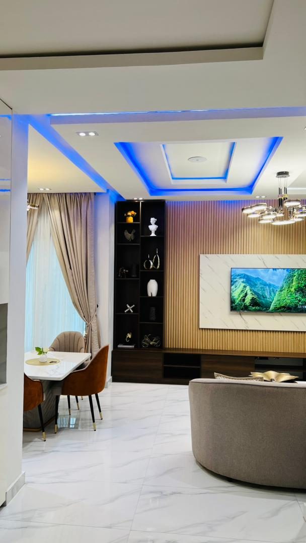 Living room in the evening, Apartment Charlie, Nimbus Nook Ikeja GRA