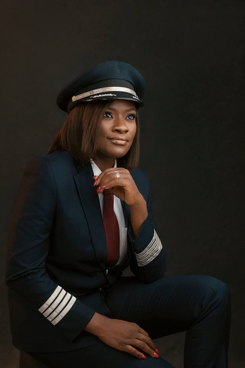 Mercy, founder and CEO of Nimbus Nook, in her pilot's uniform
